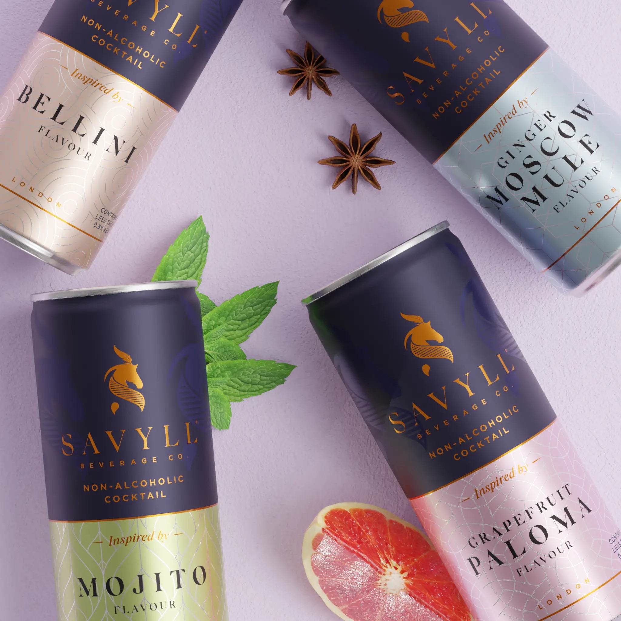 Four cans of Savyll non-alcoholic cocktails in Bellini, Moscow Mule, Mojito, and Grapefruit Paloma flavors with mint, star anise, and grapef